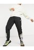 puma-classics-mcs-sweat-pants-in-black-with-animal-print-detail.jpg